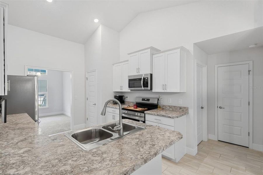 Furnished interior view inside a new home in Royal Highlands, Weeki Wachee (Image 12).