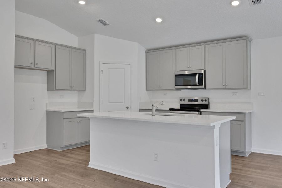 Furnished interior view inside a new home in Wilford Oaks, Orange Park (Image 4). Furnished interior view inside a new home in Wilford Oaks, Orange Park (Image 4).