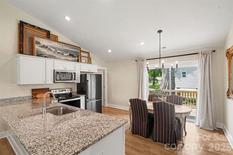 Kitchen with high ceilings and laundry off the kitchen Kitchen with high ceilings and laundry off the kitchen