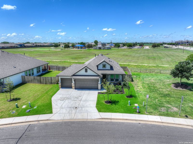Front exterior of a new home in August Fields, New Braunfels, TX, highlighting curb appeal (Image 2).