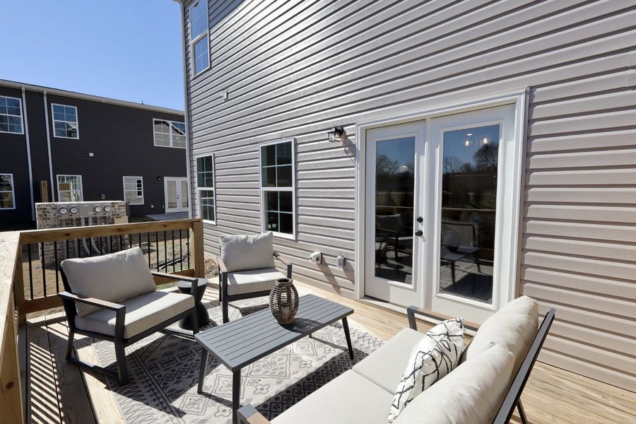 Exterior details and patio area of a home in The Eleuthera, Chattanooga (Image 4).
