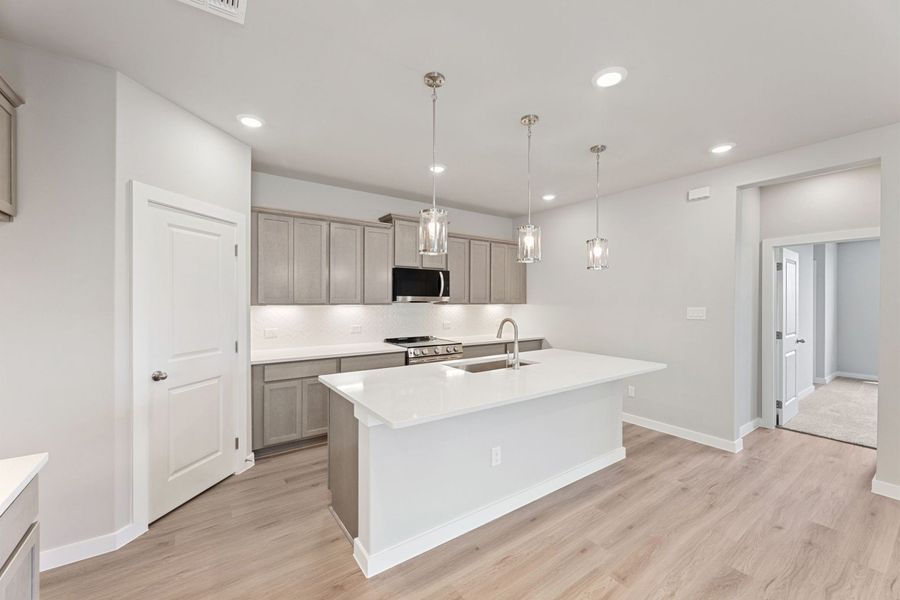 Furnished interior view inside a new home in Highland Ridge, New Braunfels (Image 7).