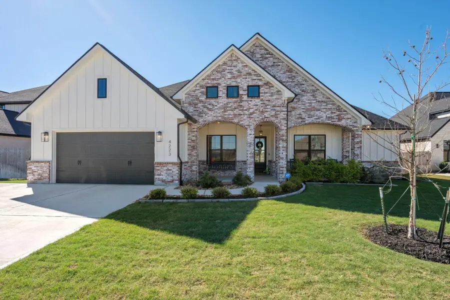 Front exterior of a new home in , College Station, TX, highlighting curb appeal (Image 2). Front exterior of a new home in , College Station, TX, highlighting curb appeal (Image 2).