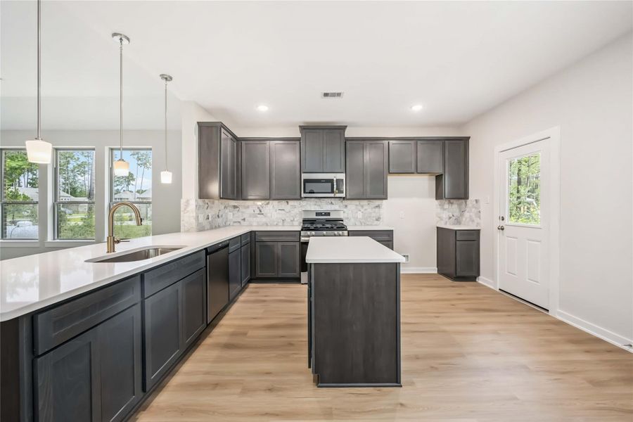 Furnished interior view inside a new home in Deer Pines, Conroe (Image 11).