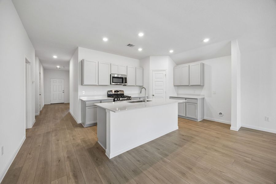 Furnished interior view inside a new home in Meridiana, Manvel (Image 9).
