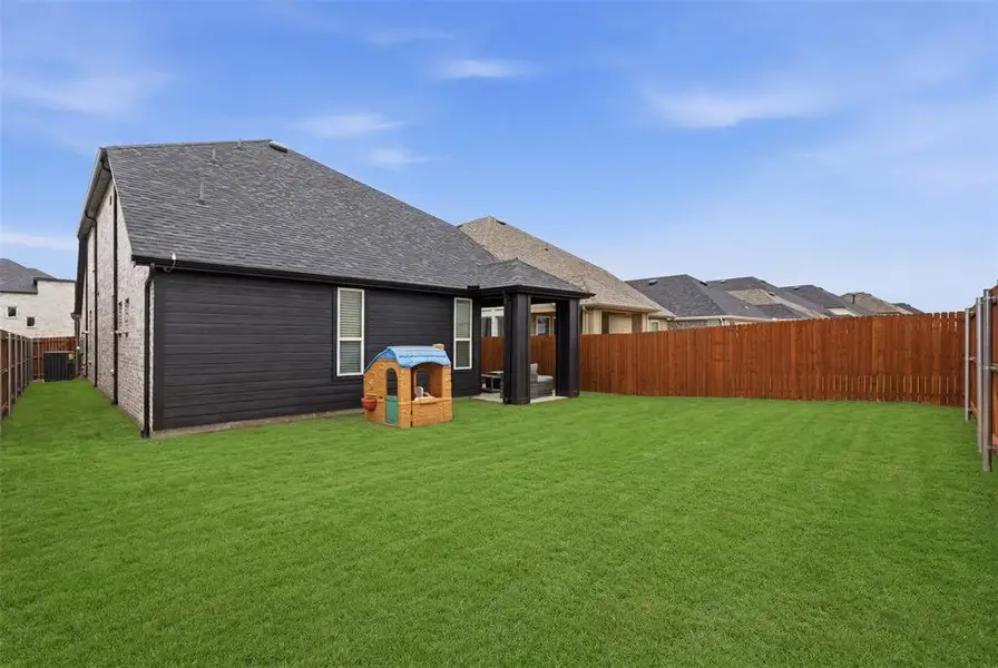 Exterior details and patio area of a home in Heartland, Heartland (Image 3).