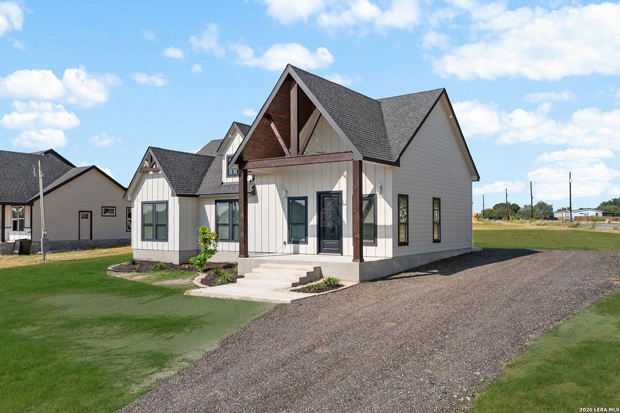 Front exterior of a new home in , Atascosa, TX, highlighting curb appeal (Image 22).