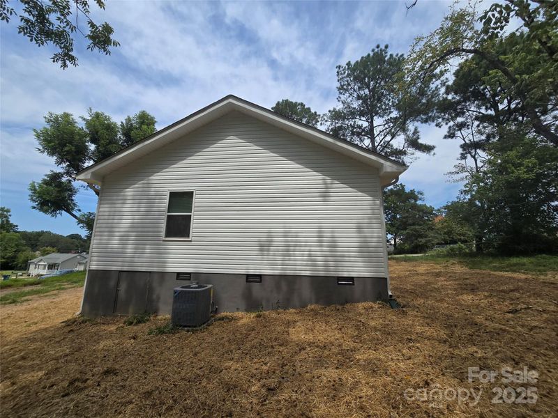 Front exterior of a new home in , Troy, NC, highlighting curb appeal (Image 15).