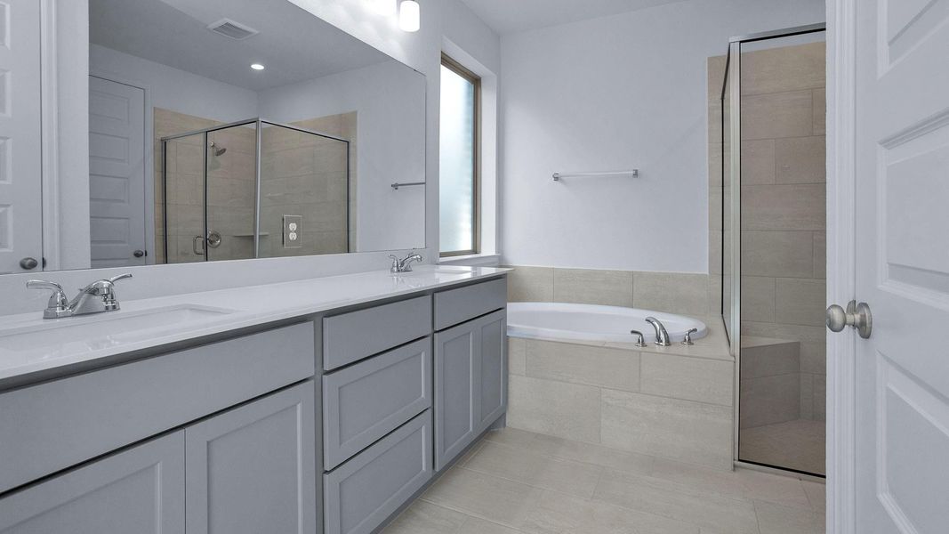 Furnished interior view inside a new home in The Groves 45', Humble (Image 6).