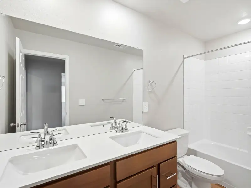 Furnished interior view inside a new home in Paint Brush Hills, Peyton (Image 7).