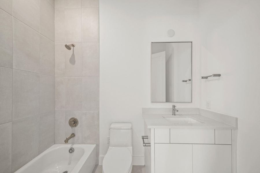 Furnished interior view inside a new home in Bridgeland, Cypress (Image 17).