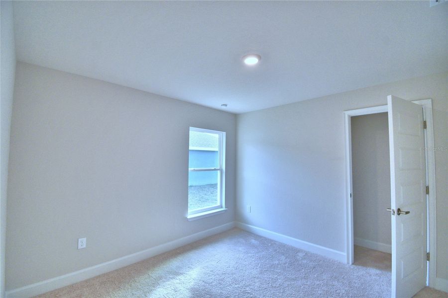 Spacious, unfurnished interior of a new home in Cadence Crossing, Auburndale (Image 26).