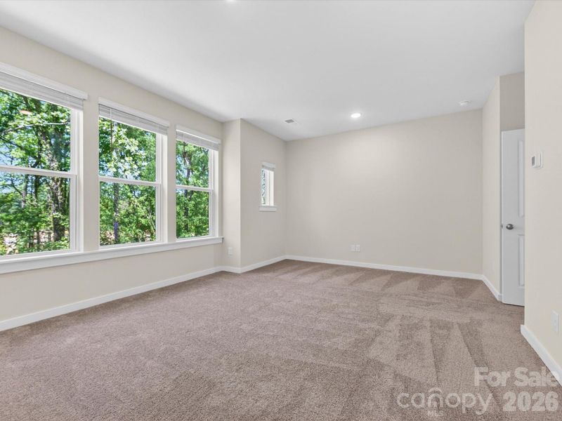 Spacious, unfurnished interior of a new home in Central Living at Craig, Charlotte (Image 23). Spacious, unfurnished interior of a new home in Central Living at Craig, Charlotte (Image 23).