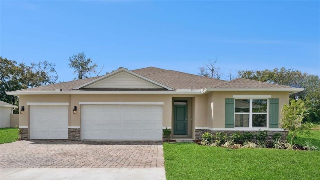 Front exterior of a new home in Northridge Reserve, Longwood, FL, highlighting curb appeal (Image 1). Front exterior of a new home in Northridge Reserve, Longwood, FL, highlighting curb appeal (Image 1).