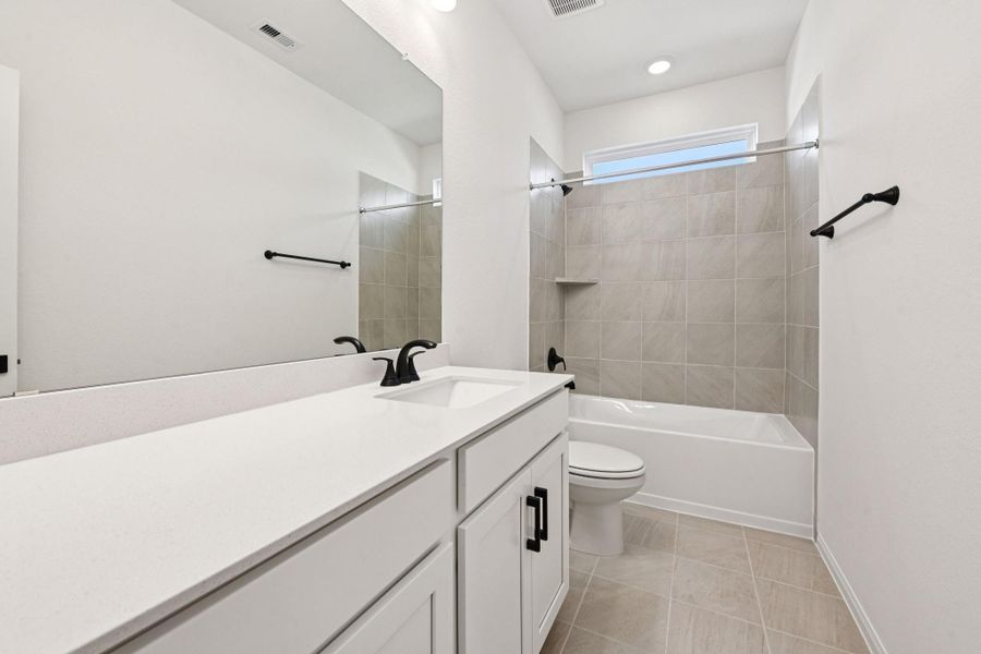 Furnished interior view inside a new home in Pinewood Trails - Luxe Series, Atascocita (Image 7). Furnished interior view inside a new home in Pinewood Trails - Luxe Series, Atascocita (Image 7).