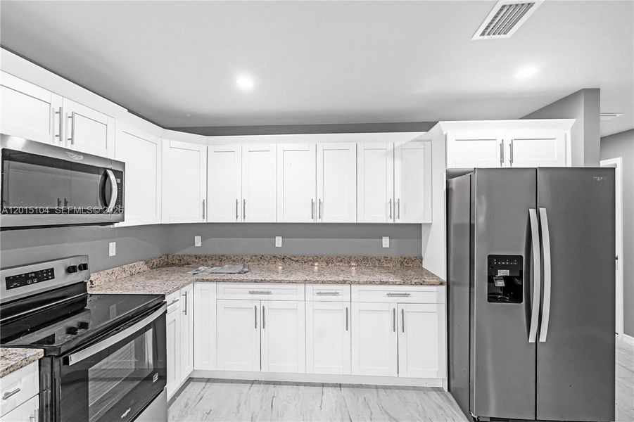 Furnished interior view inside a new home in , Fort Myers (Image 7). Furnished interior view inside a new home in , Fort Myers (Image 7).