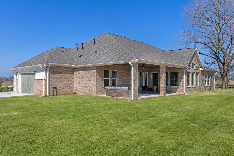 Front exterior of a new home in , Smithville, TX, highlighting curb appeal (Image 22). Front exterior of a new home in , Smithville, TX, highlighting curb appeal (Image 22).