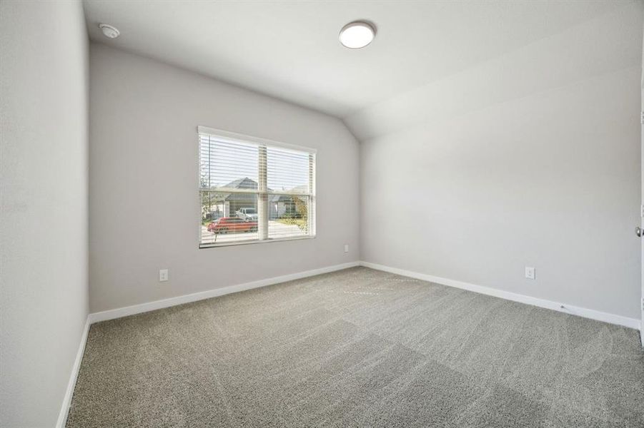 Bedroom in the Oscar home plan by Trophy Signature Homes – REPRESENTATIVE PHOTO