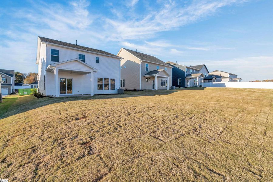 Exterior details and patio area of a home in Halton Oaks, Spartanburg (Image 3).