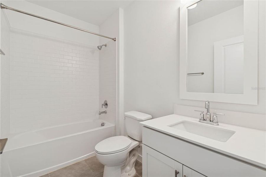 Furnished interior view inside a new home in Aspire at Canter Creek, Davenport (Image 4).