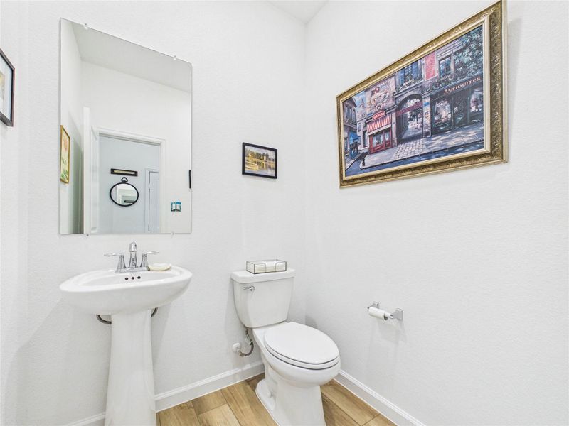 Next to the office/bonus room is this half bath.