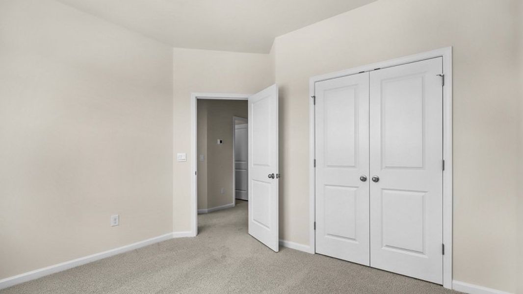 Spacious, unfurnished interior of a new home in The Townes at Madden West, Fuquay Varina (Image 21).