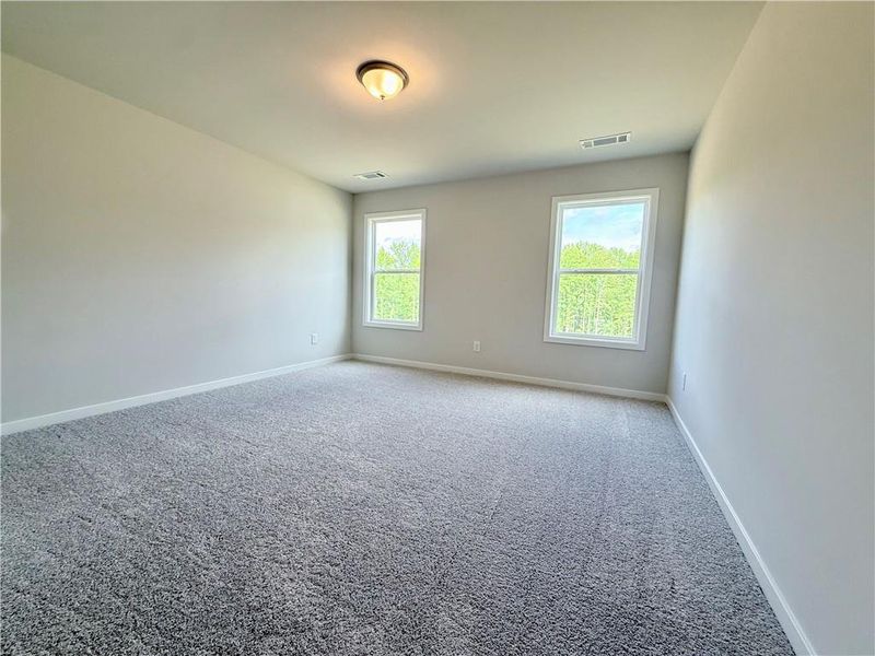 Spacious, unfurnished interior of a new home in Ponderosa Farms Reserve, Gainesville (Image 23).
