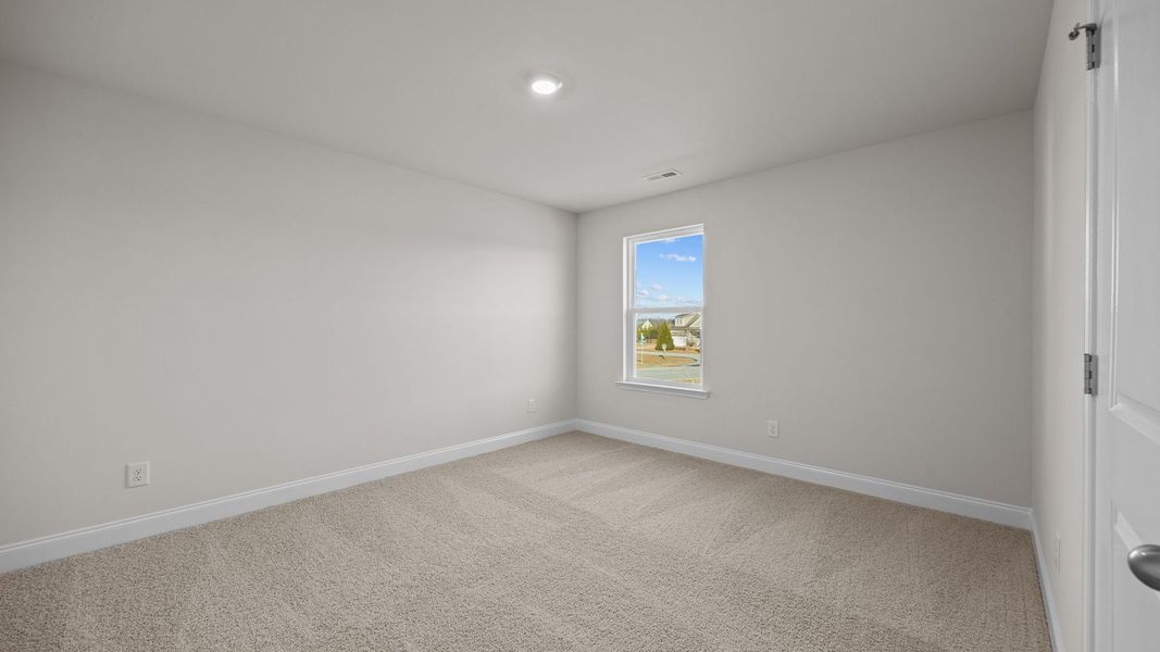 Spacious, unfurnished interior of a new home in Beaver Dam Crossing, Bailey (Image 33). Spacious, unfurnished interior of a new home in Beaver Dam Crossing, Bailey (Image 33).
