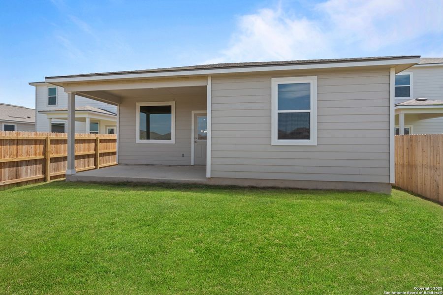 Front exterior of a new home in Talley Fields, San Antonio, TX, highlighting curb appeal (Image 17).