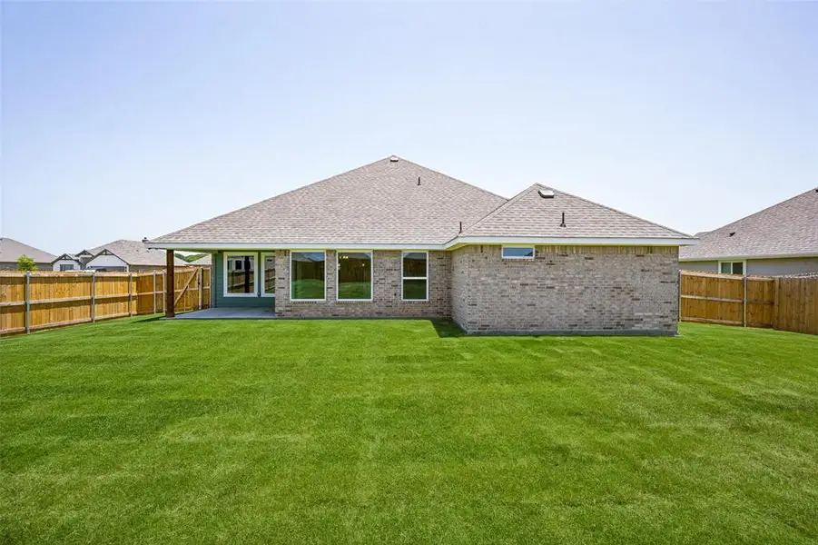 Exterior details and patio area of a home in , Sanger (Image 4). Exterior details and patio area of a home in , Sanger (Image 4).