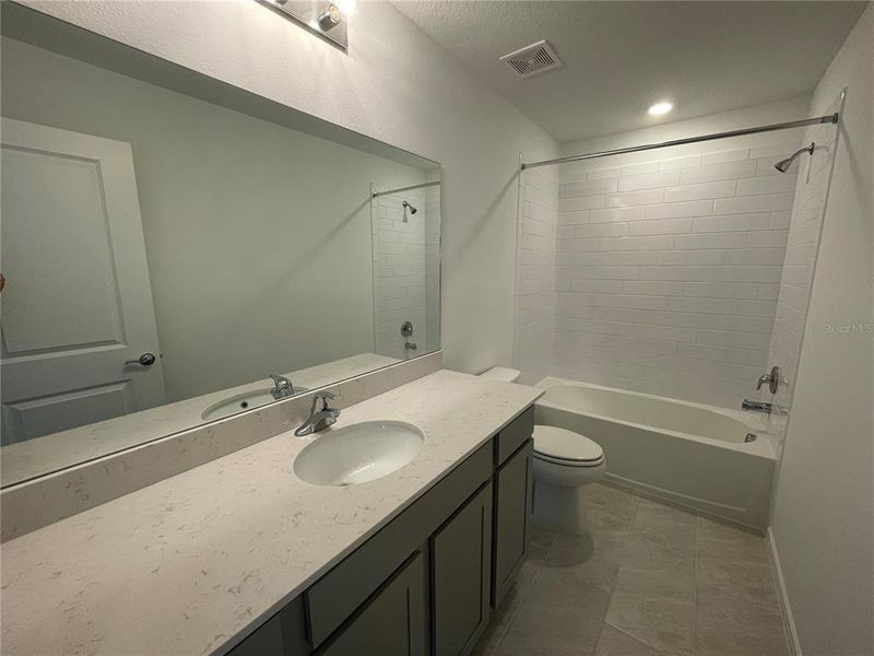 Furnished interior view inside a new home in Isles at BayView, Parrish (Image 8).