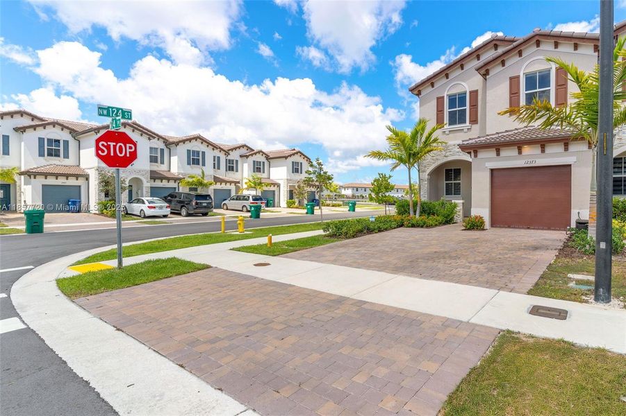 Front exterior of a new home in , Miami, FL, highlighting curb appeal (Image 18).