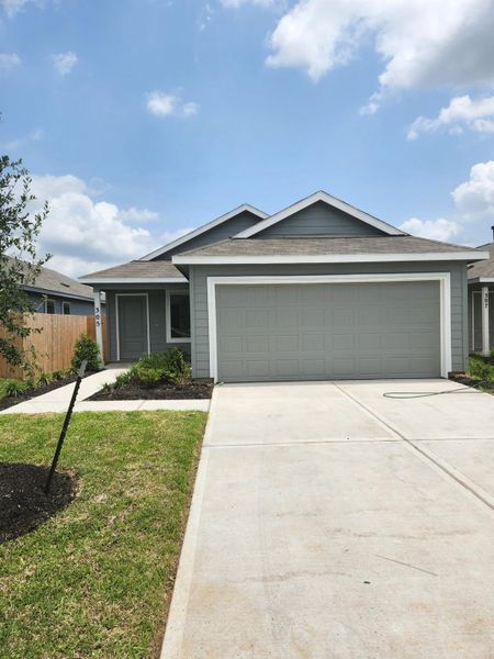 Front exterior of a new home in Wharton Lakes, Wharton, TX, highlighting curb appeal (Image 30).