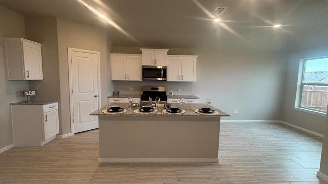 Kitchen - All Home and community information, including pricing, included features, terms, availability and amenities, are subject to change at any time without notice or obligation. All Drawings, pictures, photographs, video, square footages, floor plans, elevations, features, colors and sizes are approximate for illustration purposes only and will vary from the homes as built.