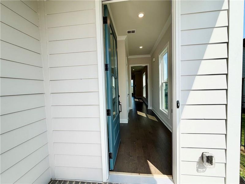 Exterior details and patio area of a home in Palisades Single Family, Cumming (Image 3).