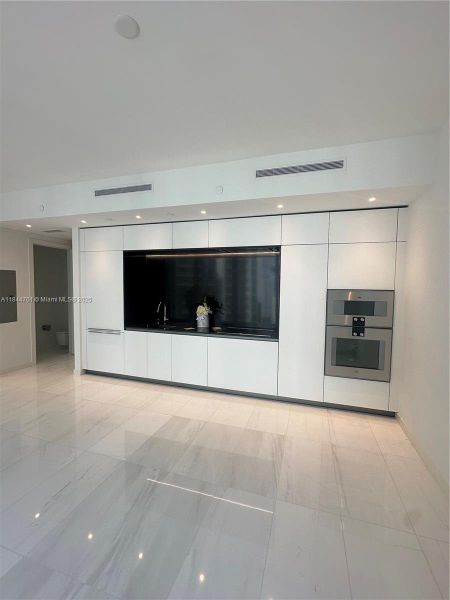 Furnished interior view inside a new home in Aston Martin Residences, Miami (Image 6).