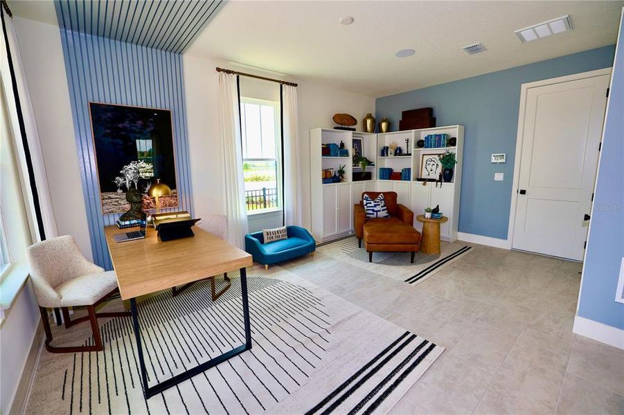 Furnished interior view inside a new home in Parkview at Hamlin, Winter Garden (Image 14).