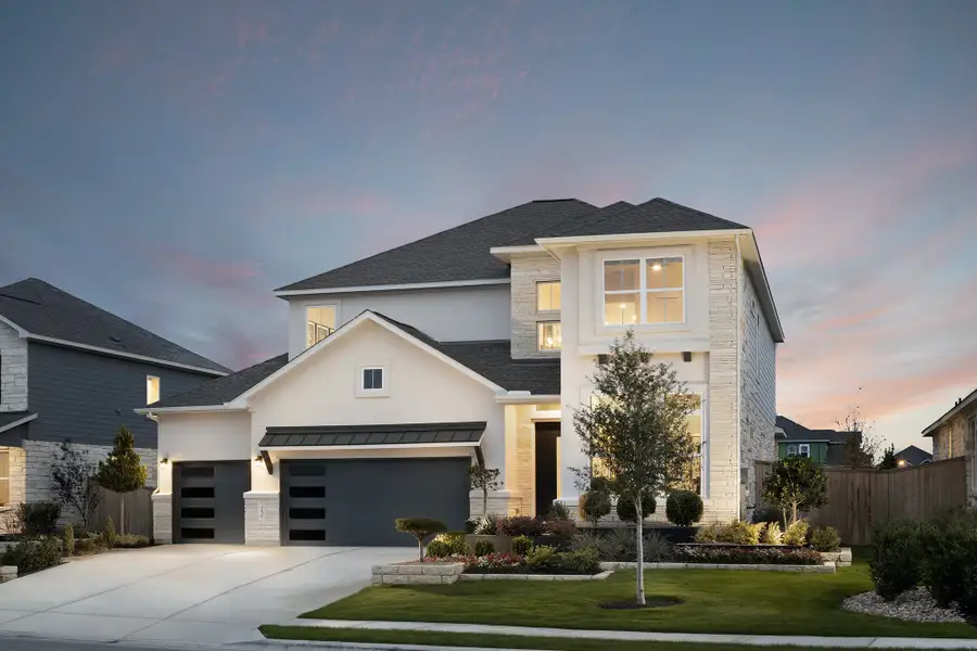 Front exterior of a new home in University Heights, Round Rock, TX, highlighting curb appeal (Image 2). Front exterior of a new home in University Heights, Round Rock, TX, highlighting curb appeal (Image 2).