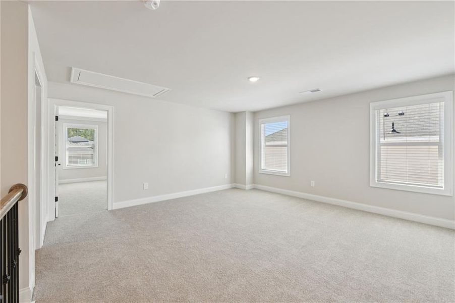 Spacious, unfurnished interior of a new home in Vines at Mill Creek - Estate Series, Braselton (Image 38).