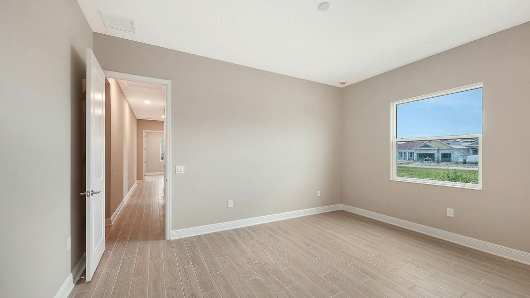 Spacious, unfurnished interior of a new home in Grand Park Real Estate and Homes for Sale in Sarasota, FL - Neal Communities, Sarasota (Image 39). Spacious, unfurnished interior of a new home in Grand Park Real Estate and Homes for Sale in Sarasota, FL - Neal Communities, Sarasota (Image 39).