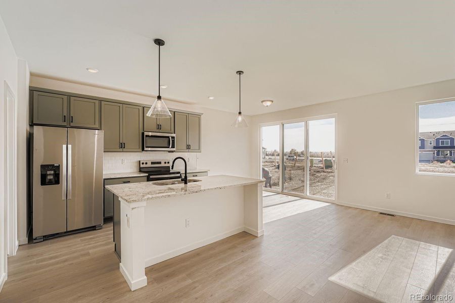 Images not from actual home, but are from same floor plan.