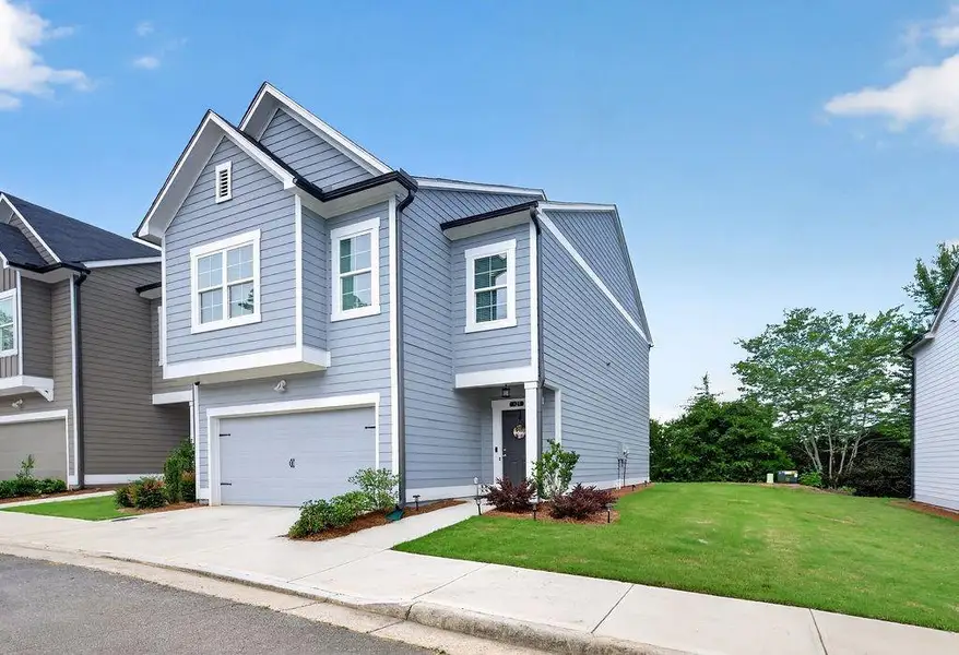 Front exterior of a new home in , Calhoun, GA, highlighting curb appeal (Image 2). Front exterior of a new home in , Calhoun, GA, highlighting curb appeal (Image 2).