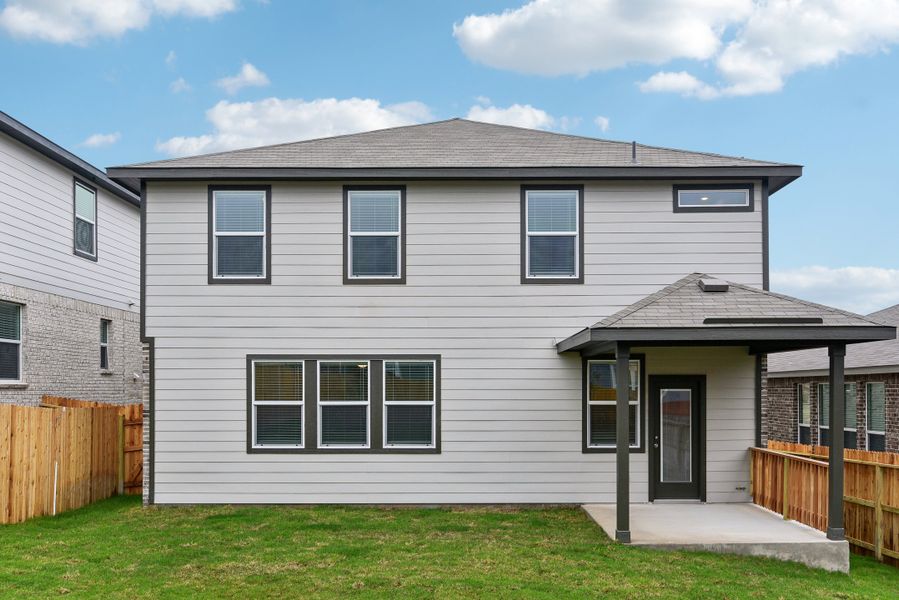 Back exterior of the Red River floorplan at a Meritage Homes community.