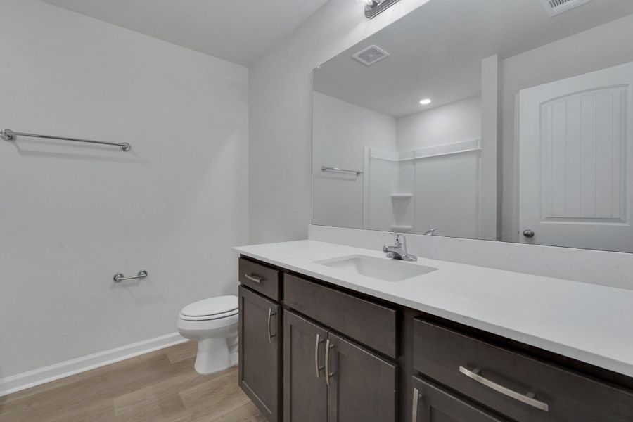 Representative furnished interior of a home built from the The Birch by Smith Family Homes in Sweetwater, Brunswick (Image 12).