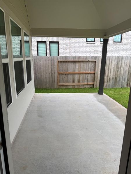 Covered back patio creates the ideal space for outdoor dining and relaxing evenings. Covered back patio creates the ideal space for outdoor dining and relaxing evenings.