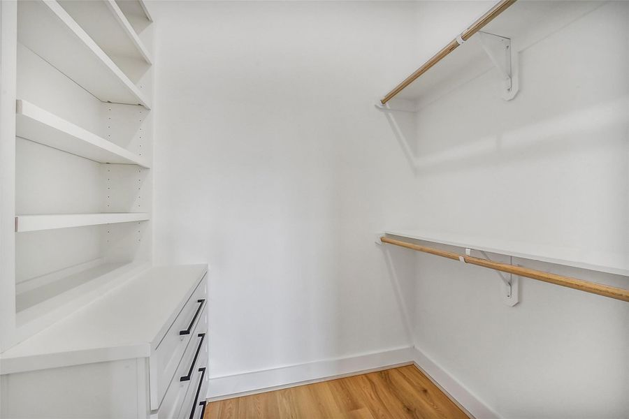 Second walk in closet located in the primary bedroom that provides additional storage with plenty of room.