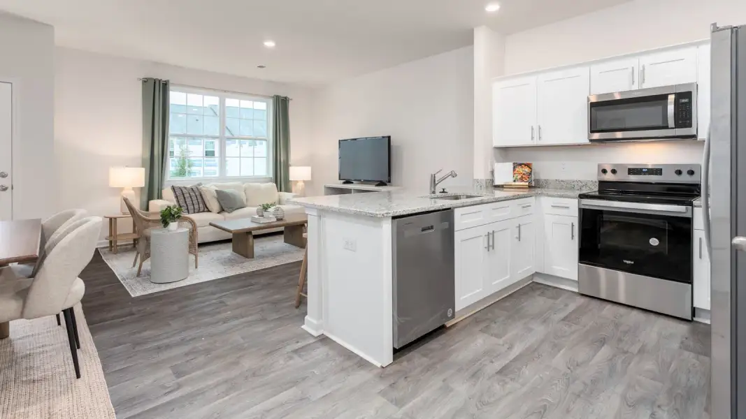 Furnished interior view inside a new home in North Village Townes, Greensboro (Image 4).