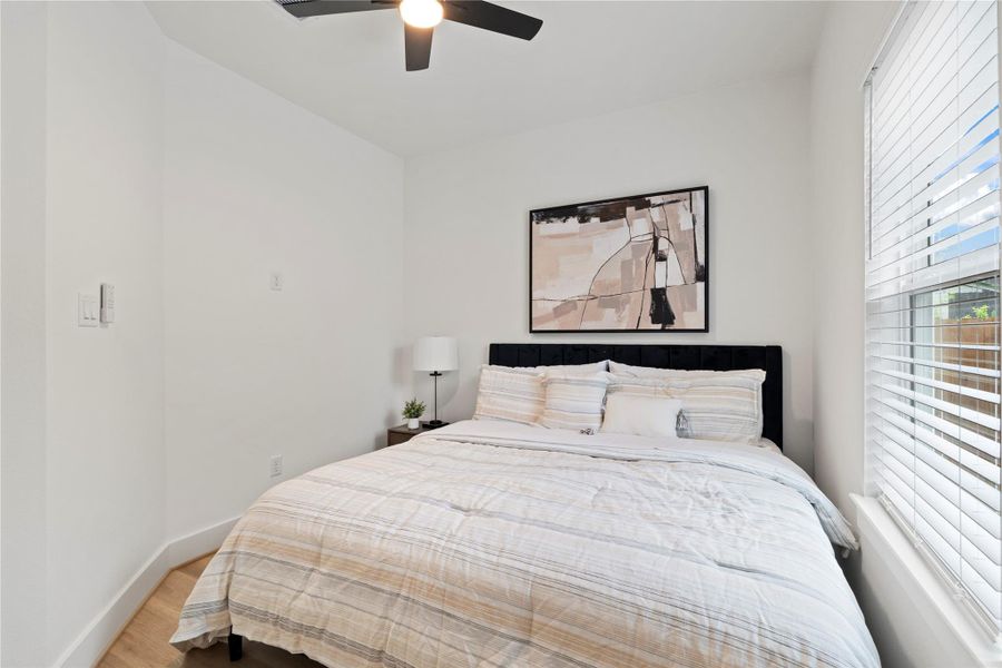 Functional by design, both rooms include full-size closets and thoughtful layouts to maximize usability.