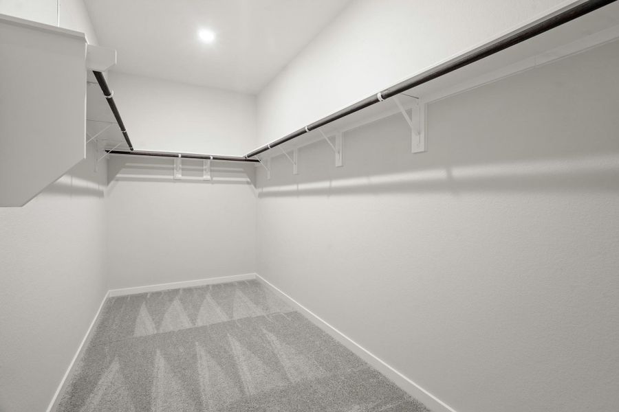 Spacious, unfurnished interior of a new home in Sunterra, Katy (Image 24).