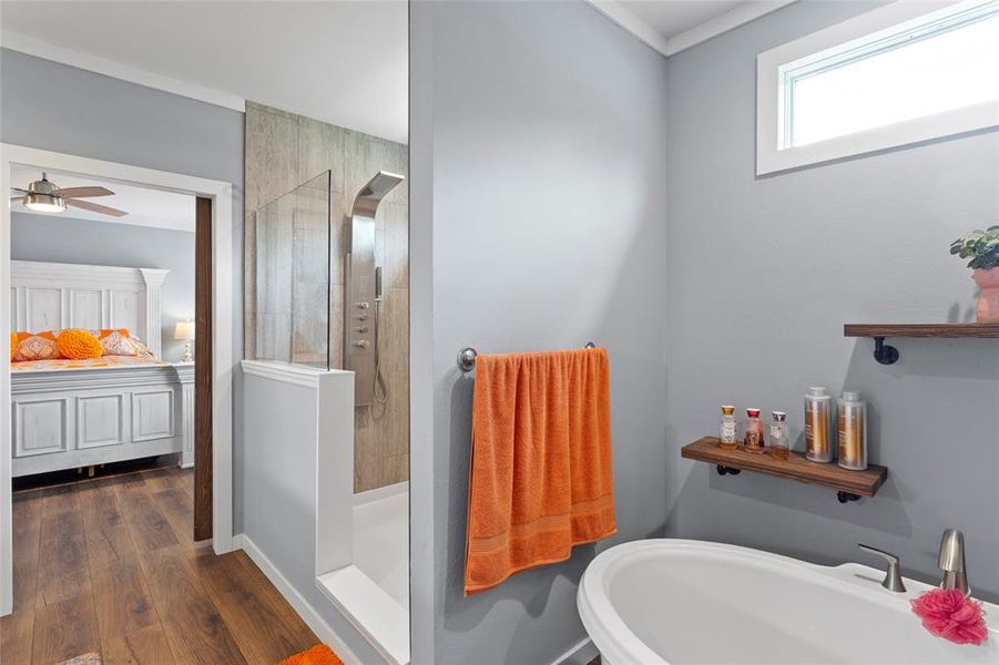 Looking back from the closet, you can clearly see the shower and the upgrades, as well as the soaker tub.  You are going to love this home!